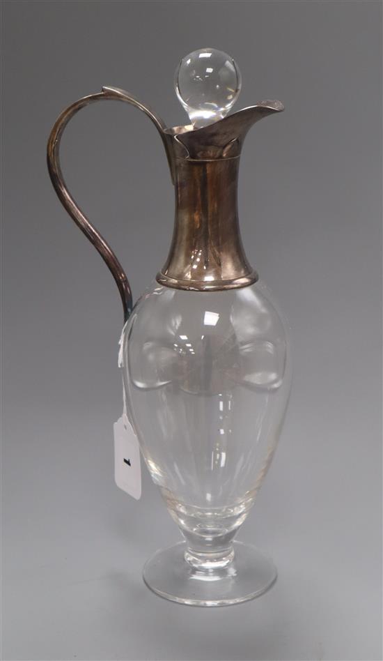 A plate-mounted claret jug and stopper, of amphora form height 35cm